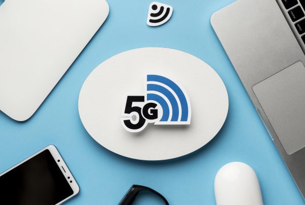 Earnings to Remain Intact on 5G Dual-Network Model 2 top view wi fi router with smartphone laptop