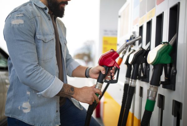 person spending time gas station