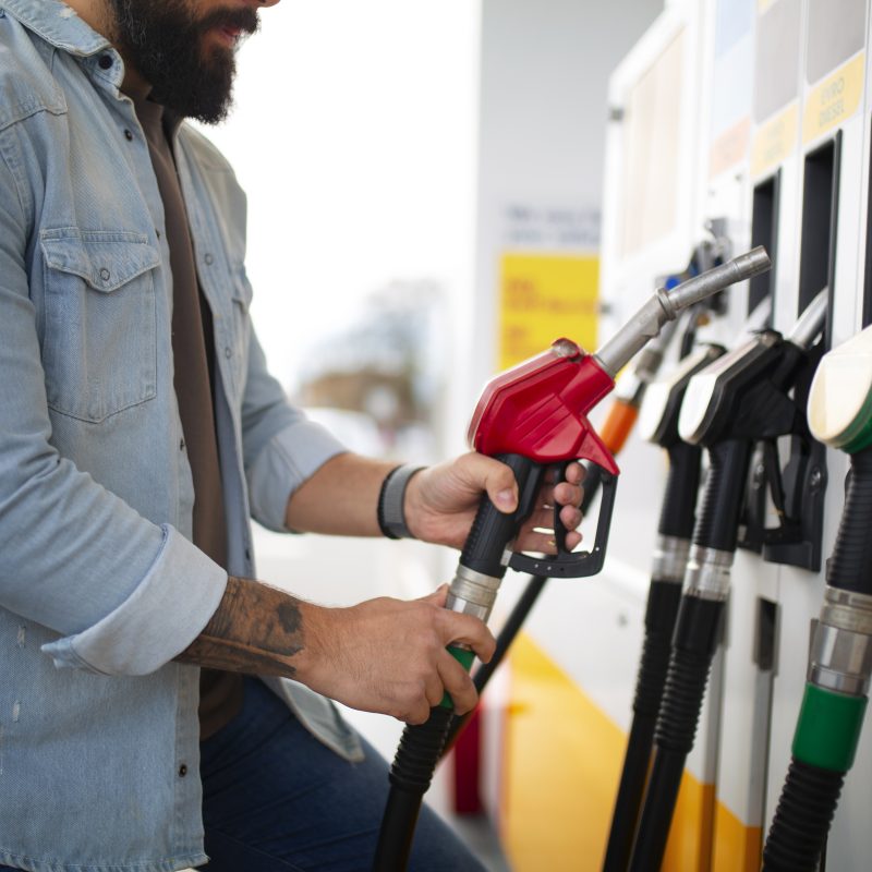 person spending time gas station